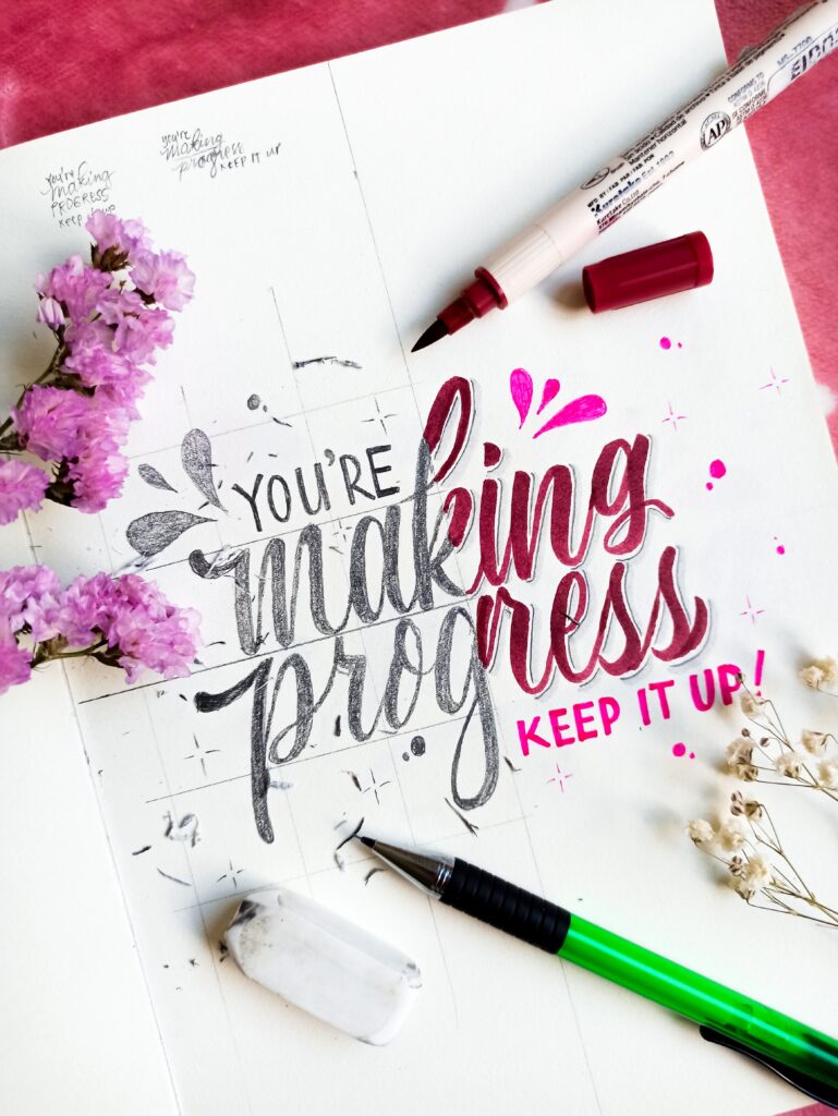 a colorful drawing that reads ‘if you’re making progress keep it up!’